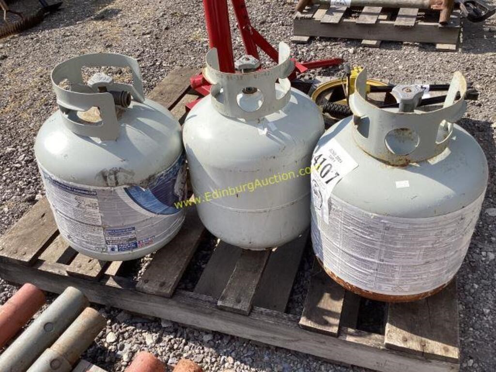 D1. (3) propane tanks empty