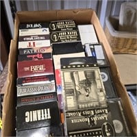 Box Full Of VHS Tapes-John Wayne, Titanic, IT, Etc