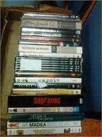 Box of approximately 25 DVDs