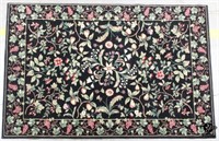 Synthetic Black Floral Rug 7'8" x 6'5"