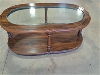 Glass top coffee table 54"L