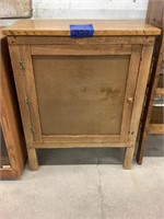 Small wooden cabinet with removable back