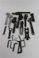 Collection of adjustable wrenches, grips, ect.