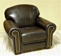 Leather Armchair with Nail Head Trim.