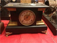 Black Mantel Clock with Brass Feet