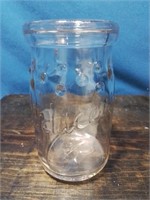Vintage glass producers jar