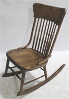 Carved Oak Spindle Back Rocker