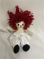 Miniature Raggedy Ann doll