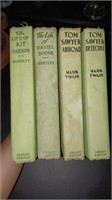 4 old hardback books Kit Carson Tom Sawyer D Boone