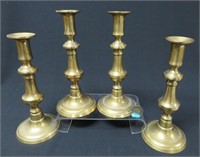 4 matching Victorian brass push-up candlesticks,