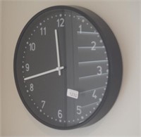 Black faced wall clock