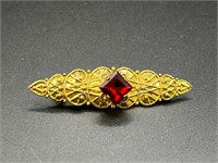Unique Gold toned and red brooch