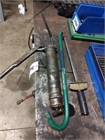 Small pry bar, torque wrench, and grease gun