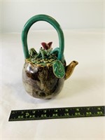 Glazed ceramic frog tea kettle