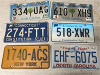 TRAY OF LICENSE PLATES