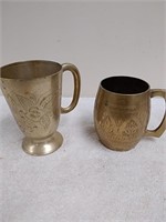 2 brass mugs