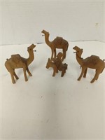 Wood camel's and man on a donkey