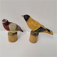 Carved wood birds