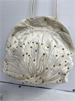 White handbag with shoulder strap