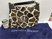 Dooney & Bourke giraffe print purse with storage