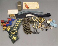 Group of military patches, belts, duffel bag, etc.