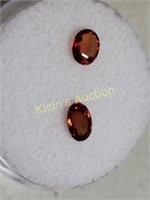 pair of gemstones oval songea orange sapphires