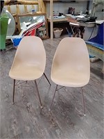 2 vintage plastic metal frame chairs