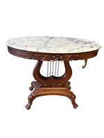 VICTORIA ROSE CARVED LYRE BASE OVAL TABLE