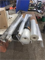 Quantity of plastic building wrap and tarpaper