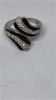 Ring with black & white stones marked 925 size 7