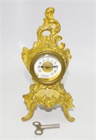 Ornate gilt metal bedroom clock