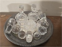 Silver plate with lot of glass decanter caps