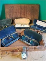 Vintage gold frame eye glasses in cases