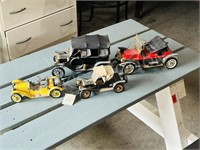 4 vintage cast car models - some damage