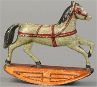ROCKING HORSE PENNY TOY