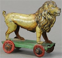 LION ON WHEELS PENNY TOY