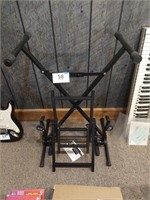 Keyboard stand and one other unknown stand