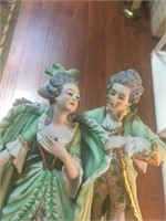 German man and woman figurine about 8.5" tall
