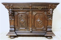 Henri II Style Lion Head Carved Oak Cabinet.