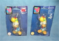 Pair of early Disney figural character candles