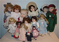 14 Unmatched Porcelain Dolls in Varied Sizes