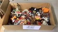 Several small plastic animals, fence and