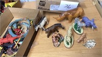 Several small wooden animals, plastic, snakes,