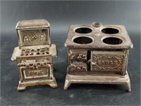 2 Cast iron salesman sample stoves, both missing p