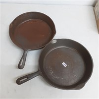 Set of two assorted cast iron frying pans