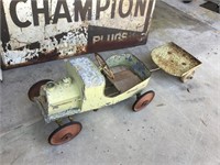 Early pedal car with home made trailer