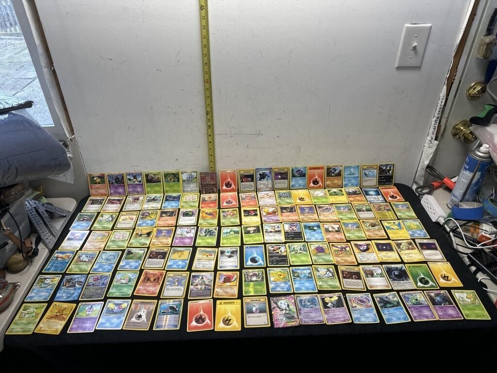 a lot of Pokémon cards
