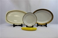Assortment of Gold Rimmed Serving Dishes