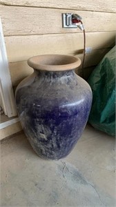 Large dark blue pottery vase water fountain