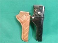 Two leather holsters one 5" and the hunter is 6".